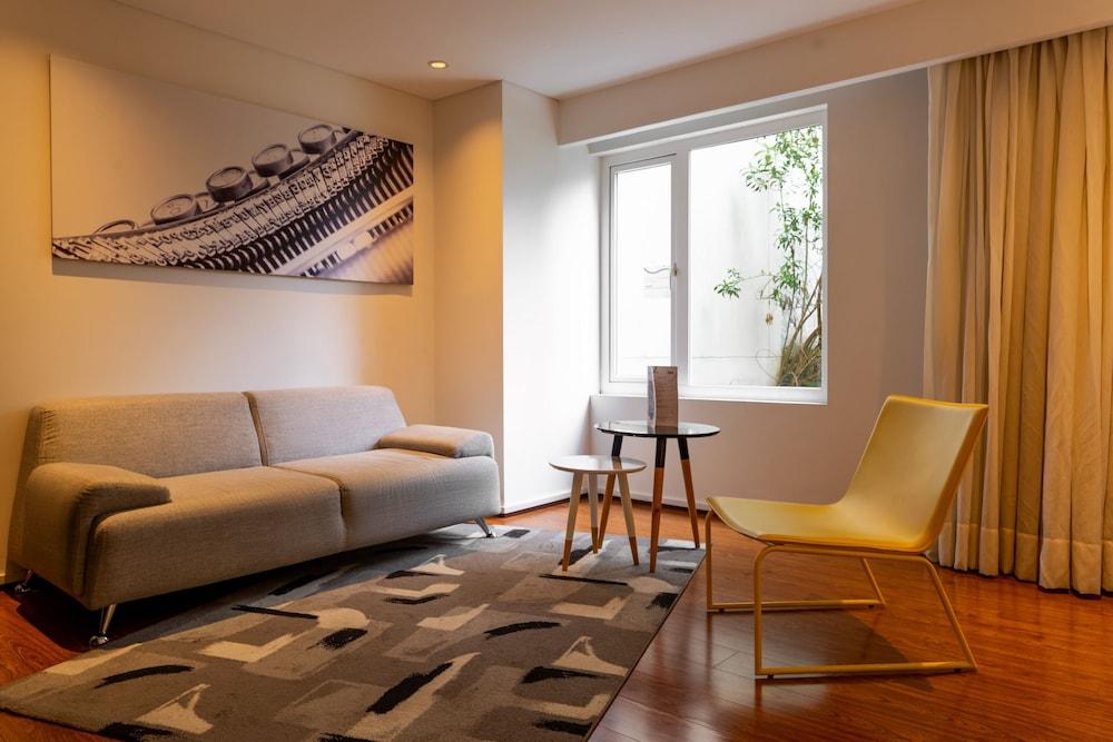 Quo Quality Hotel Manizales Esterno foto A living room in a hotel