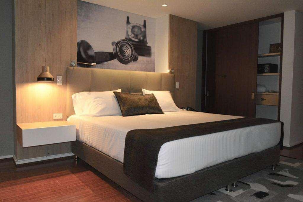 Quo Quality Hotel Manizales Camera foto A bedroom at the hotel