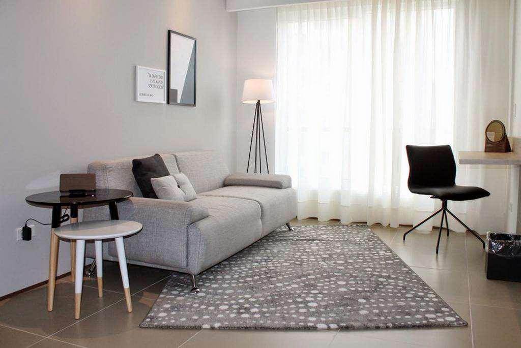 Quo Quality Hotel Manizales Camera foto A living room with a rug